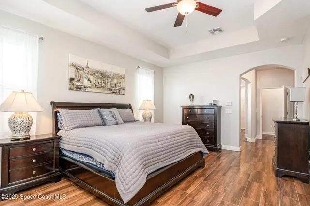 a bathroom with a sink a mirror and a bathtub