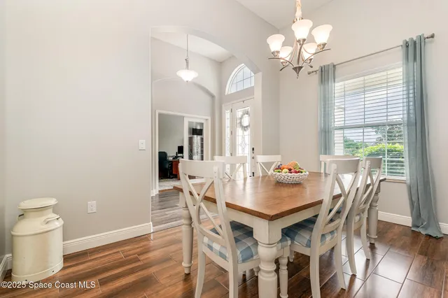 a kitchen with granite countertop a stove oven and a sink