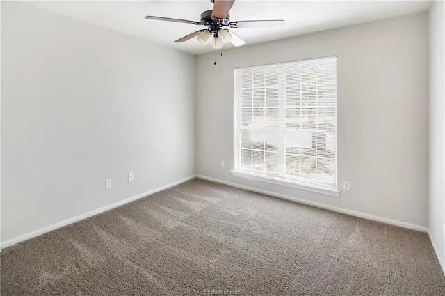 a bathroom with a toilet and a sink