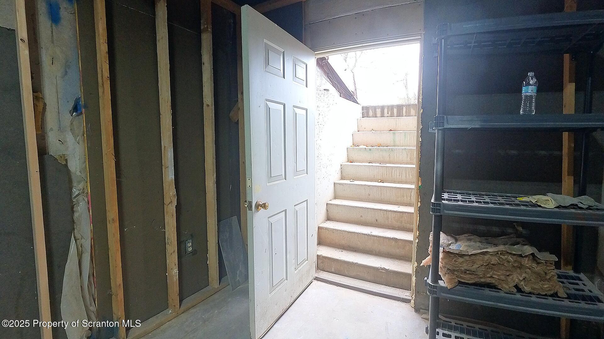 193 South Cedar Street Hazleton, PA 18201 - Photo 21 of 27 a view of a livingroom with wooden floor and a window