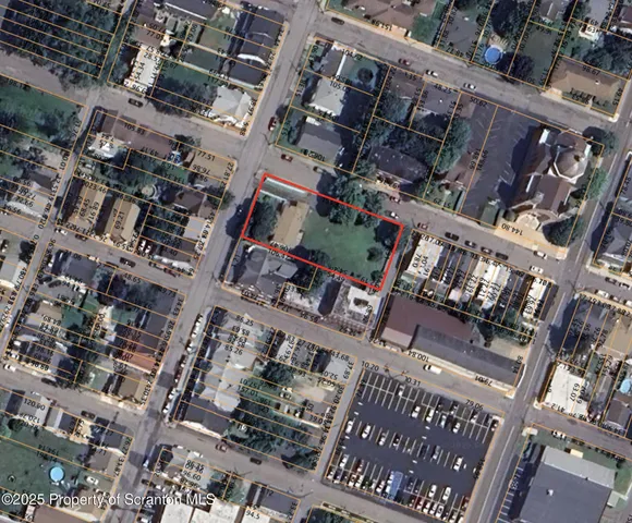 a view of a patio with table and chairs with wooden floor