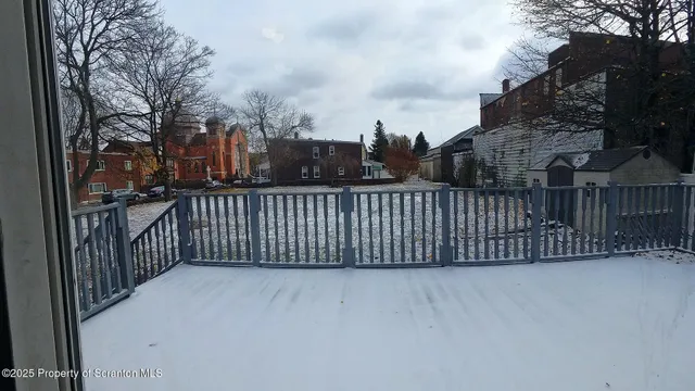 a view of a street from a balcony