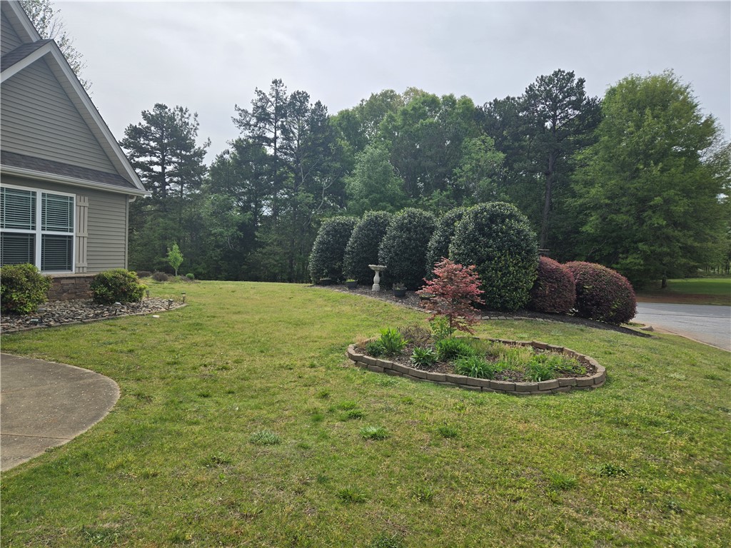 304 Knoll View Drive Seneca, SC 29678 - Photo 35 of 36 This lush lawn offers beautiful landscaping and a well-maintained exterior.