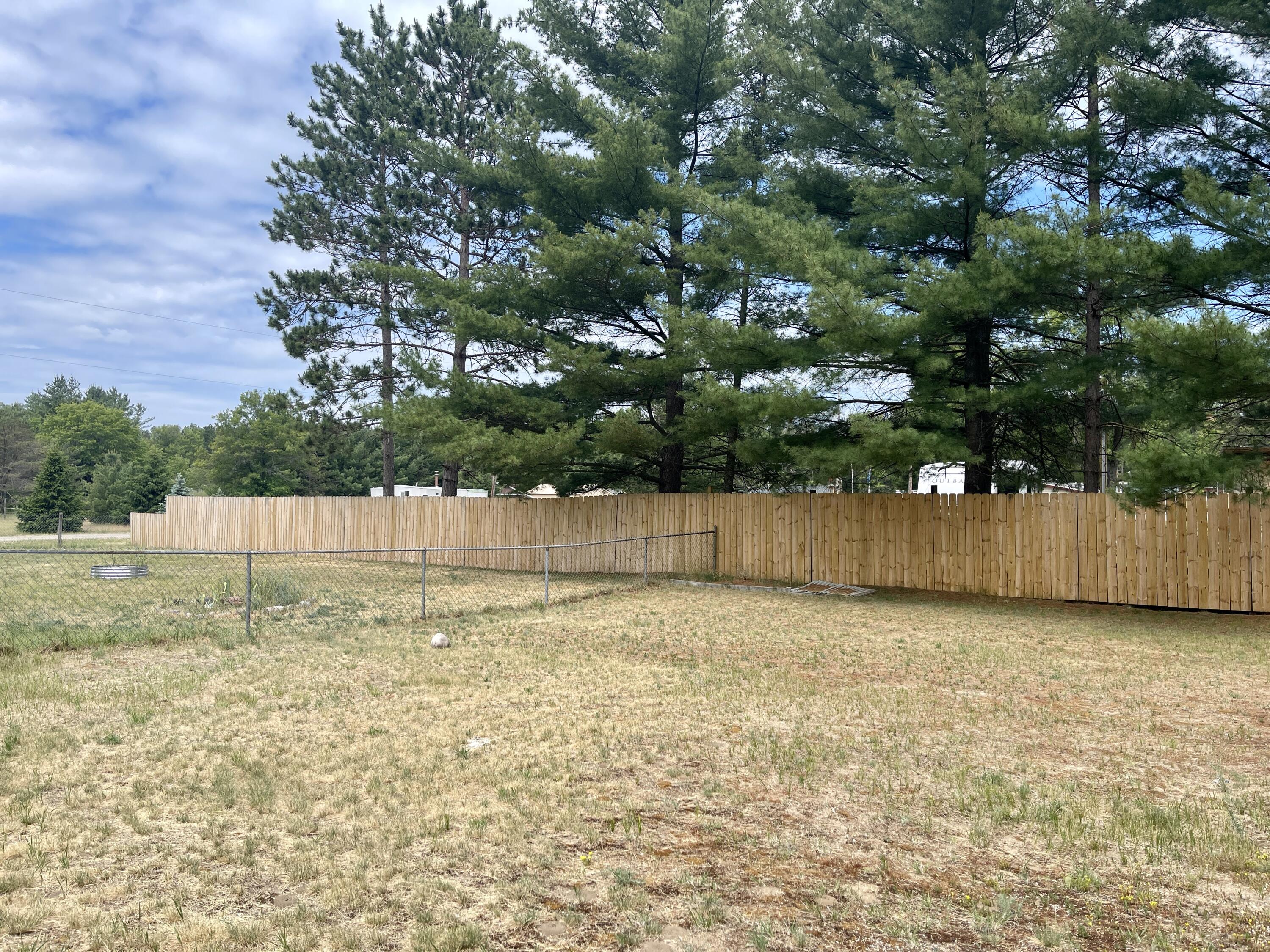 2256 Ryno Road Luzerne, MI 48636 - Photo 10 of 10 New Privacy Fence in Backyard