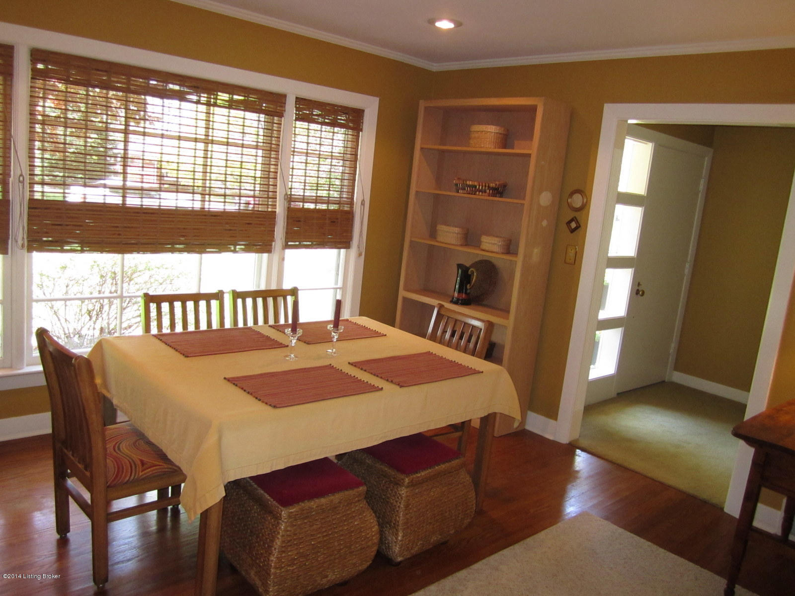 211 South Hampton Road Louisville, KY 40222 - Photo 12 of 30 Living room is large enough to include this table and still offer much space