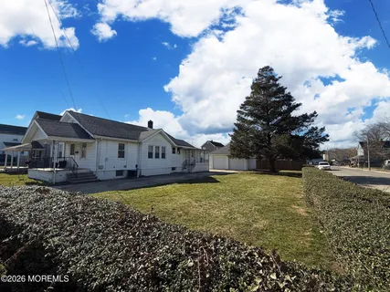a house view with a garden space