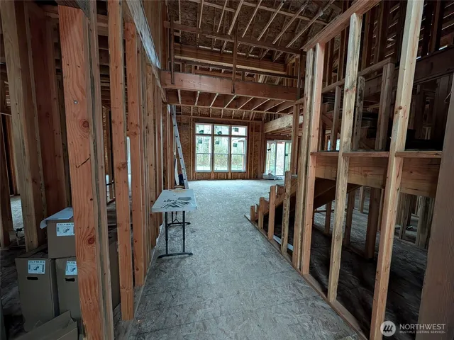 a view of an empty room with a balcony