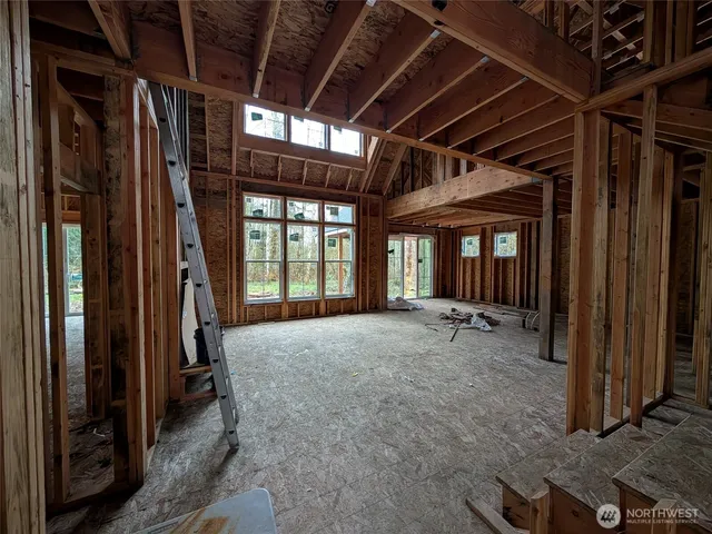 a view of an empty room with wooden frame