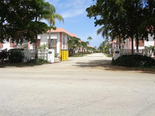 a view of a street with houses