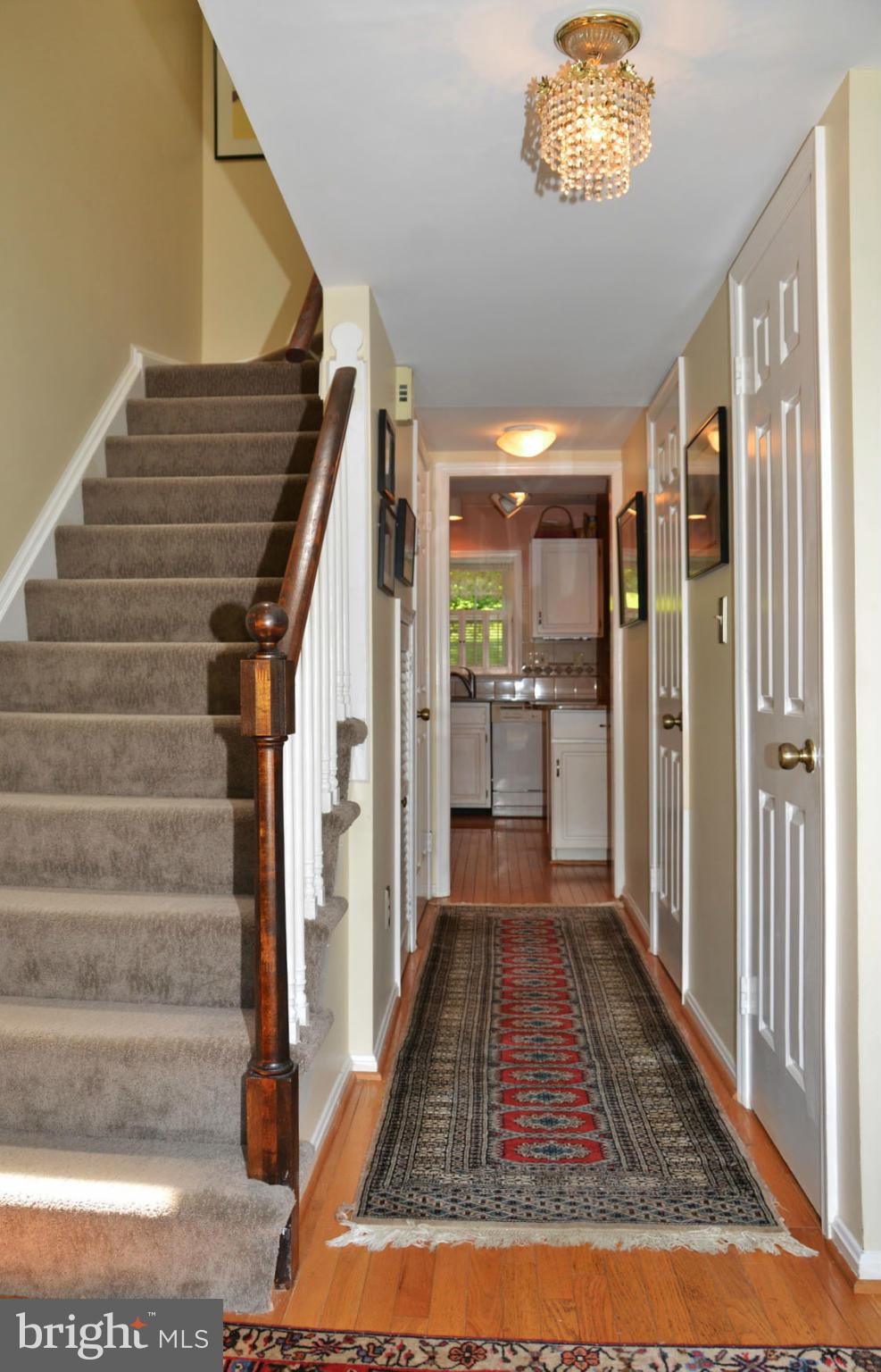6607 Hillandale Road, Unit 89 Chevy Chase, MD 20815 - Photo 30 of 30 a view of entryway and hall with wooden floor