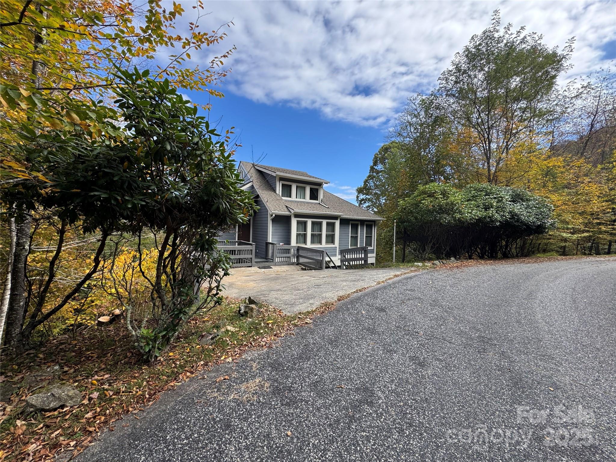 92 Goldenleaf Road Mars Hill, NC 28754 - Photo 6 of 23 a view of a house with a yard