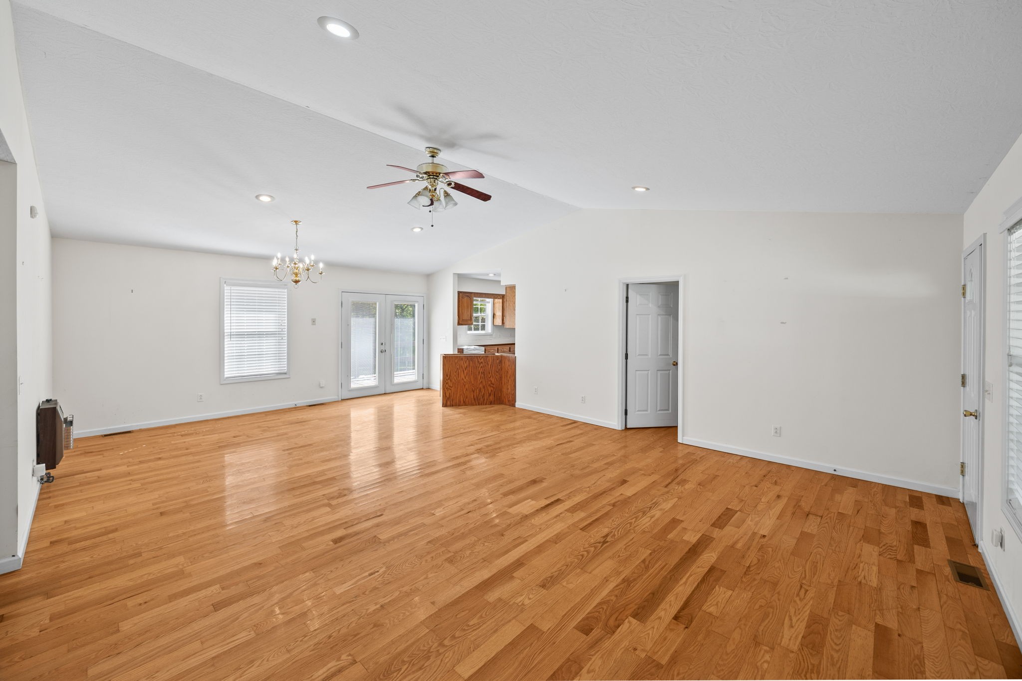 1357 Franklin Loop Clarkrange, TN 38553 - Photo 2 of 37 a view of empty room with wooden floor and ceiling fan