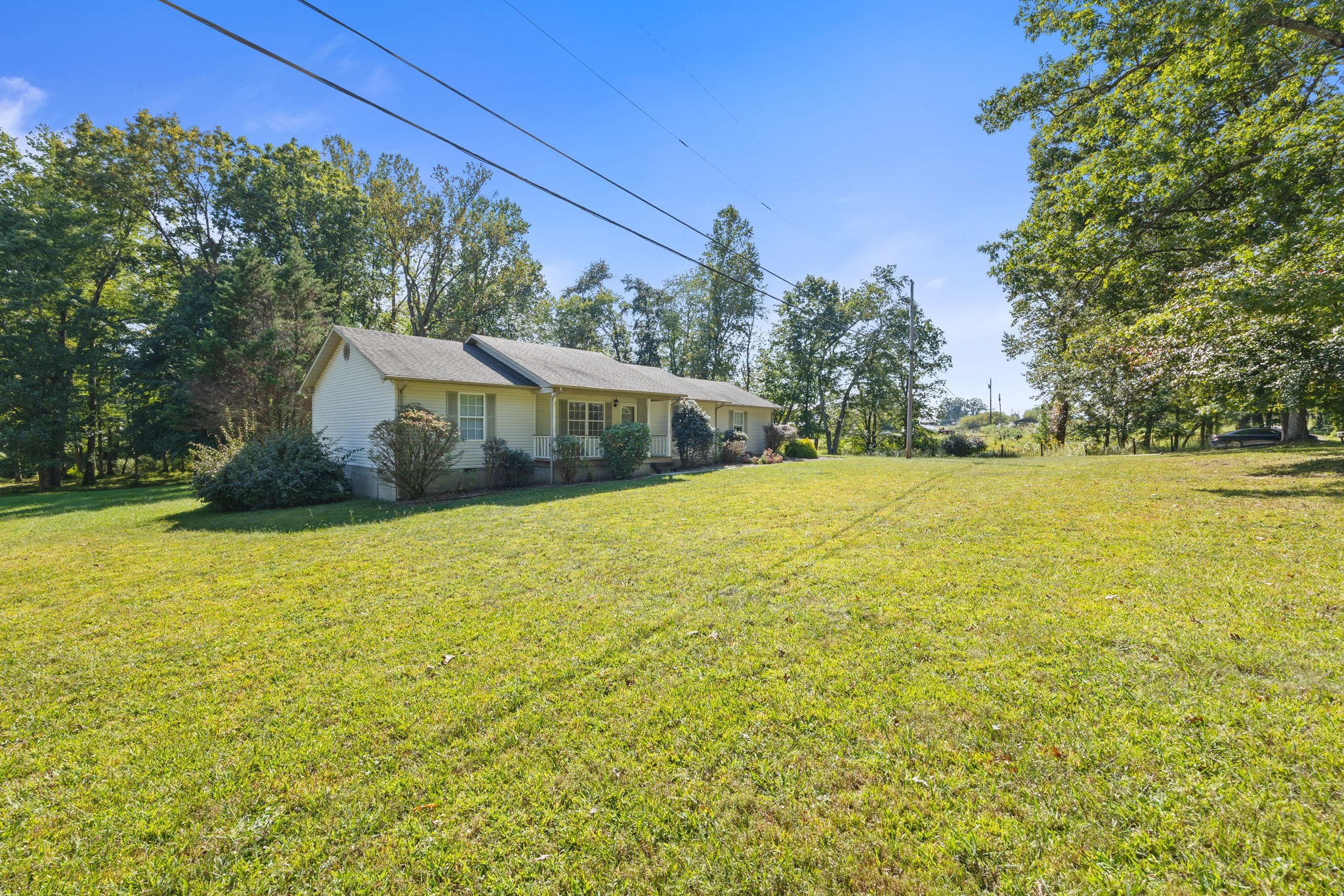 1357 Franklin Loop Clarkrange, TN 38553 - Photo 22 of 37 a view of an ocean swimming pool and trees in the background