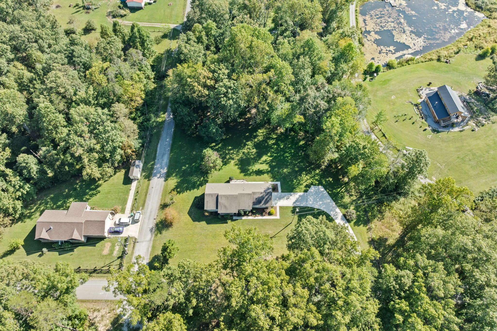 1357 Franklin Loop Clarkrange, TN 38553 - Photo 30 of 37 a backyard of a house with yard and outdoor seating