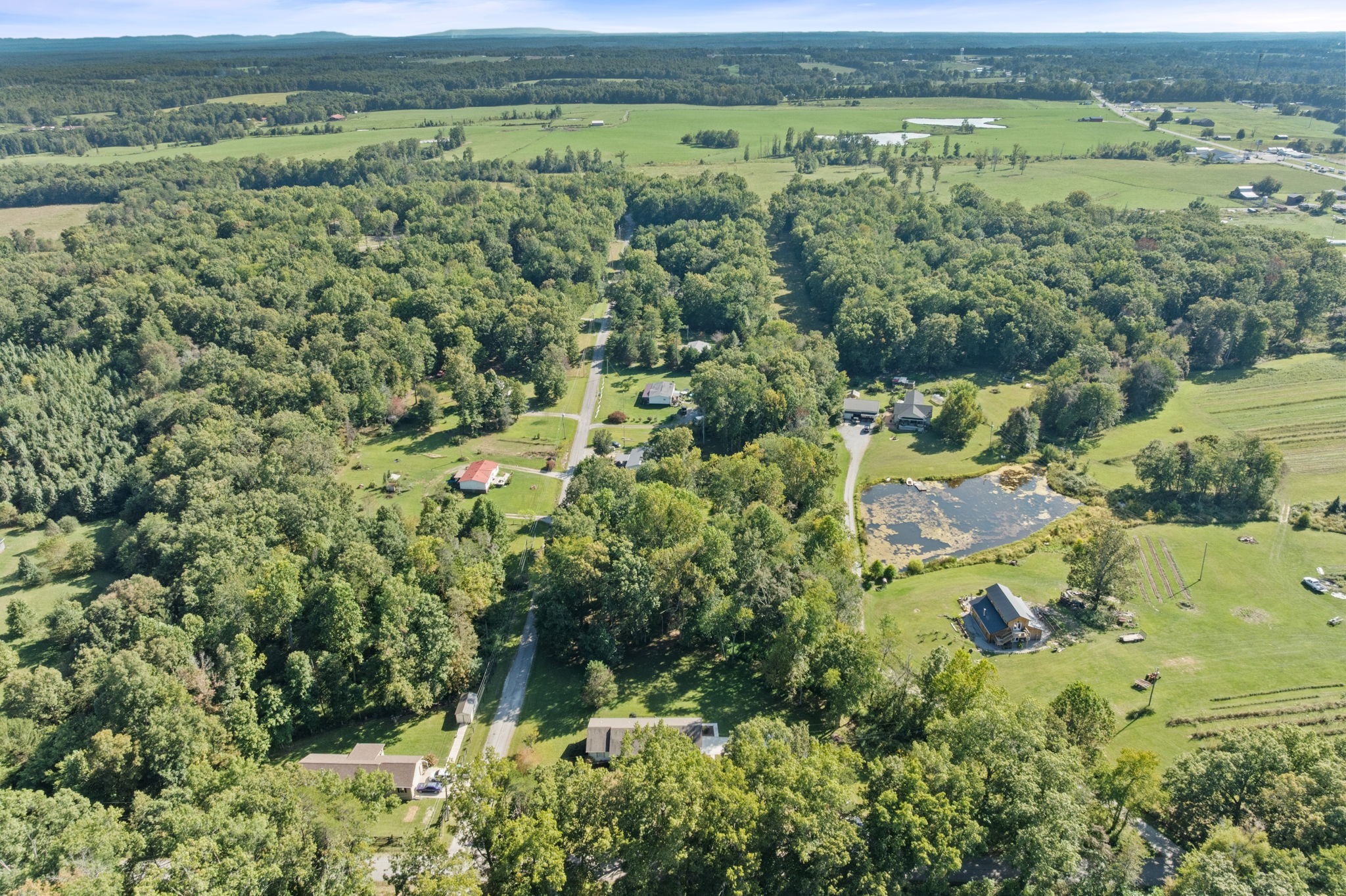 1357 Franklin Loop Clarkrange, TN 38553 - Photo 31 of 37 a view of a lush green field with an outdoor space