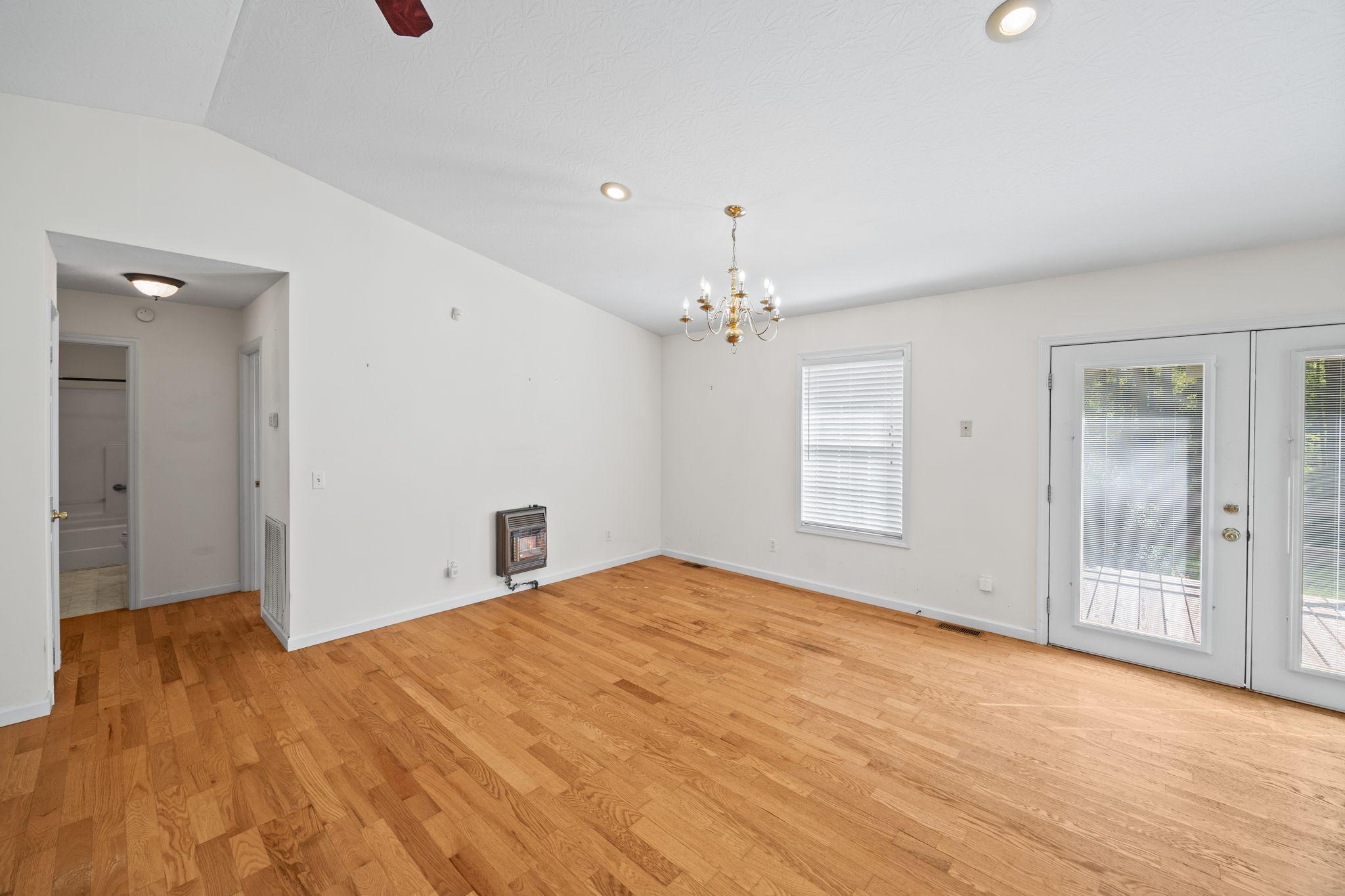 1357 Franklin Loop Clarkrange, TN 38553 - Photo 5 of 37 wooden floor in an empty room with a window