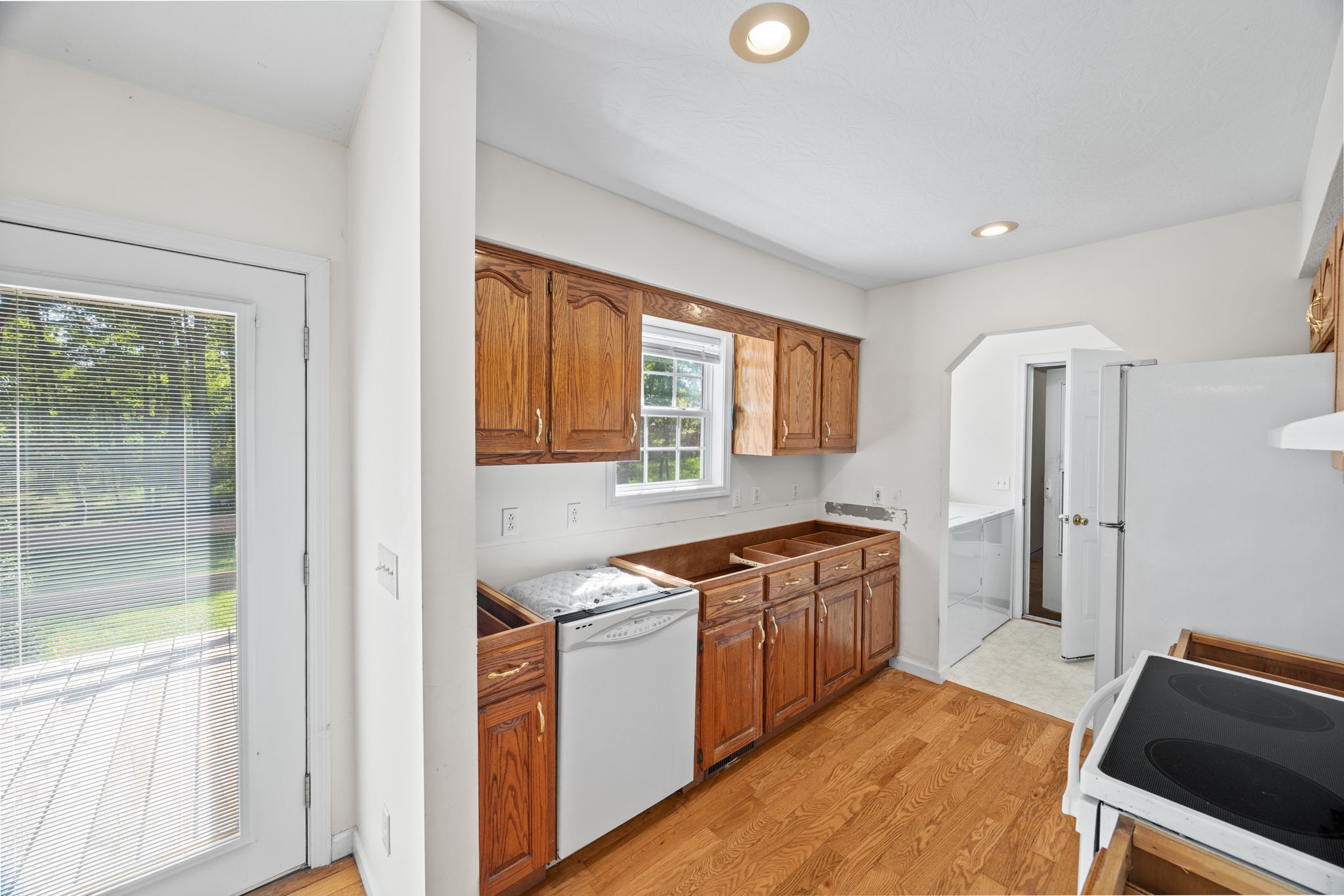 1357 Franklin Loop Clarkrange, TN 38553 - Photo 6 of 37 a kitchen with stainless steel appliances granite countertop a stove a sink and a refrigerator