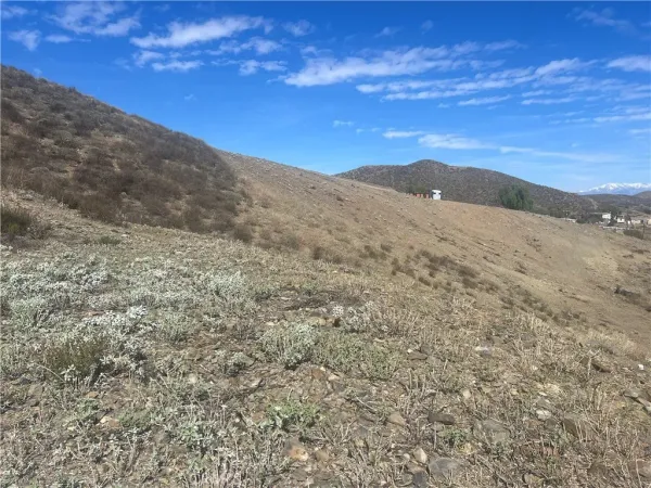 a view of mountain view with mountains in the background