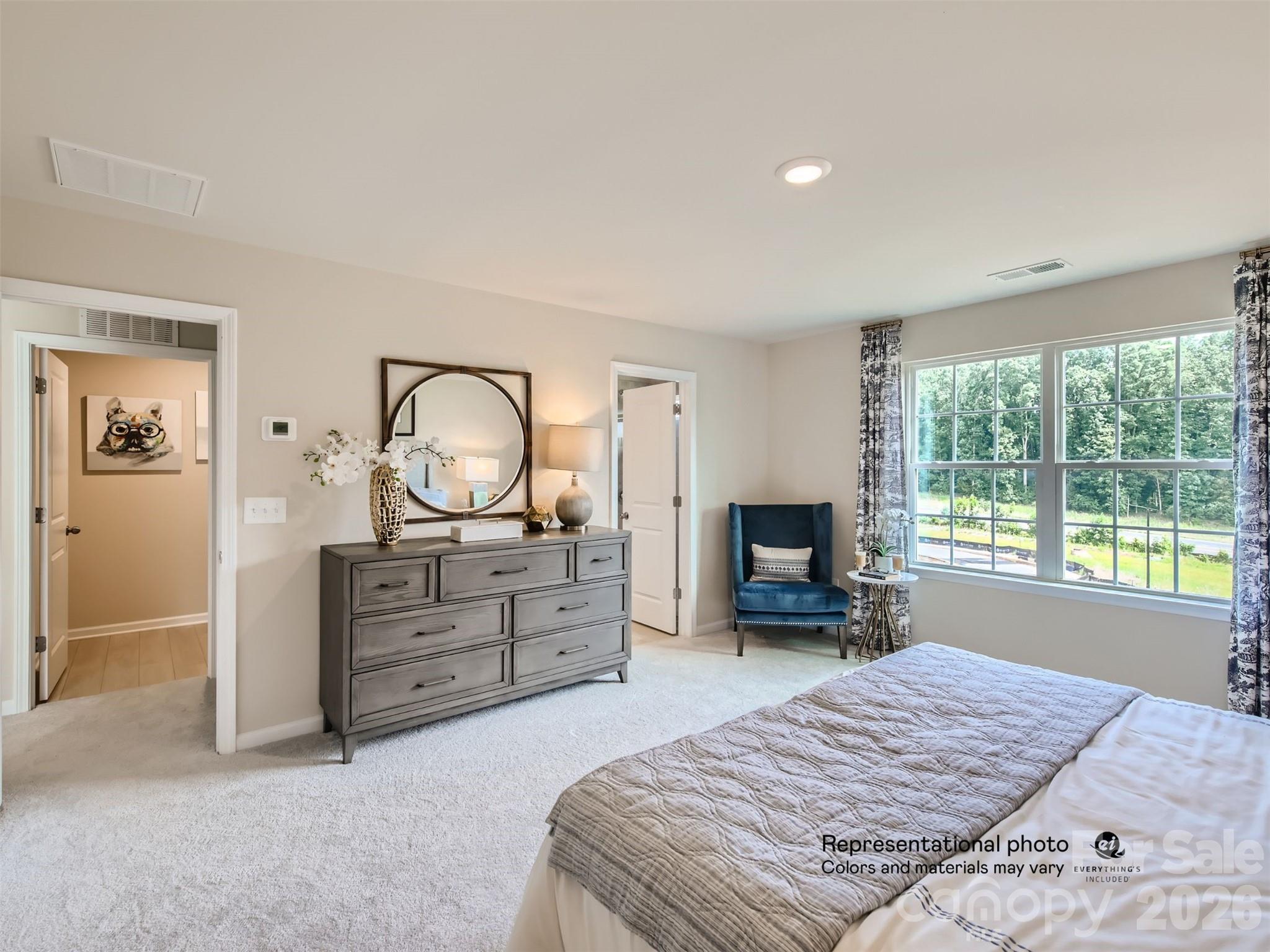 7020 Juneberry Way Maiden, NC 28650 - Photo 12 of 25 a bed room with a bed and a television