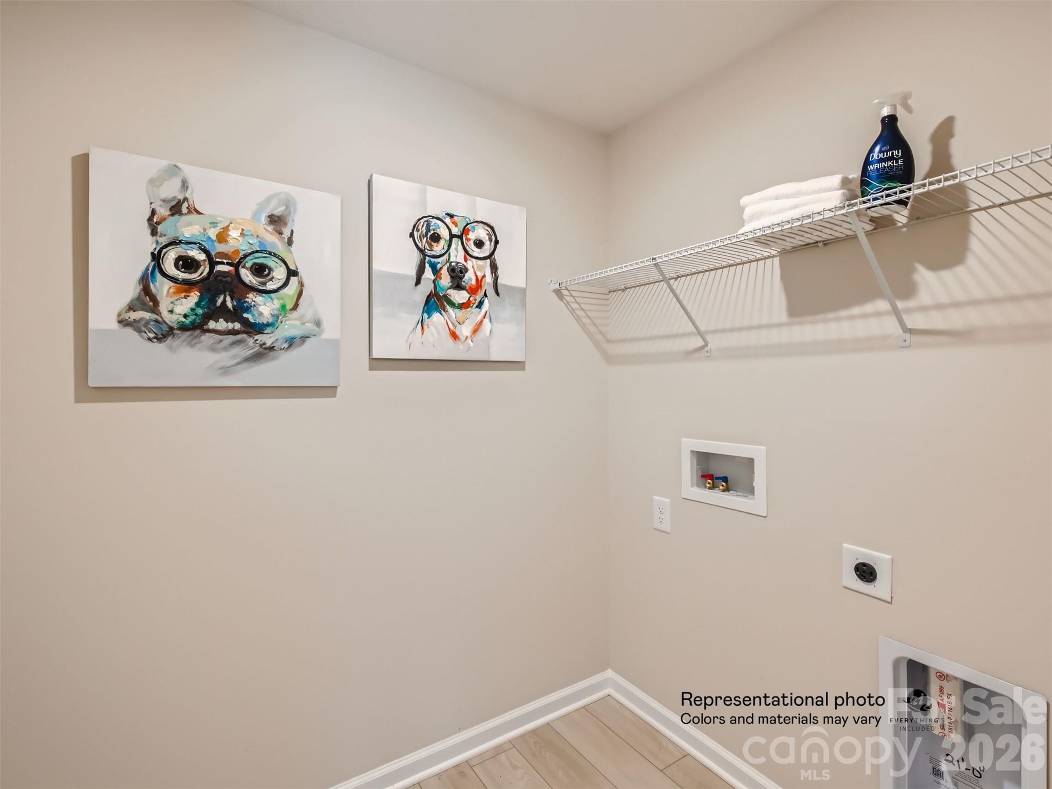 7020 Juneberry Way Maiden, NC 28650 - Photo 14 of 25 a view of a hallway with a refrigerator and a window
