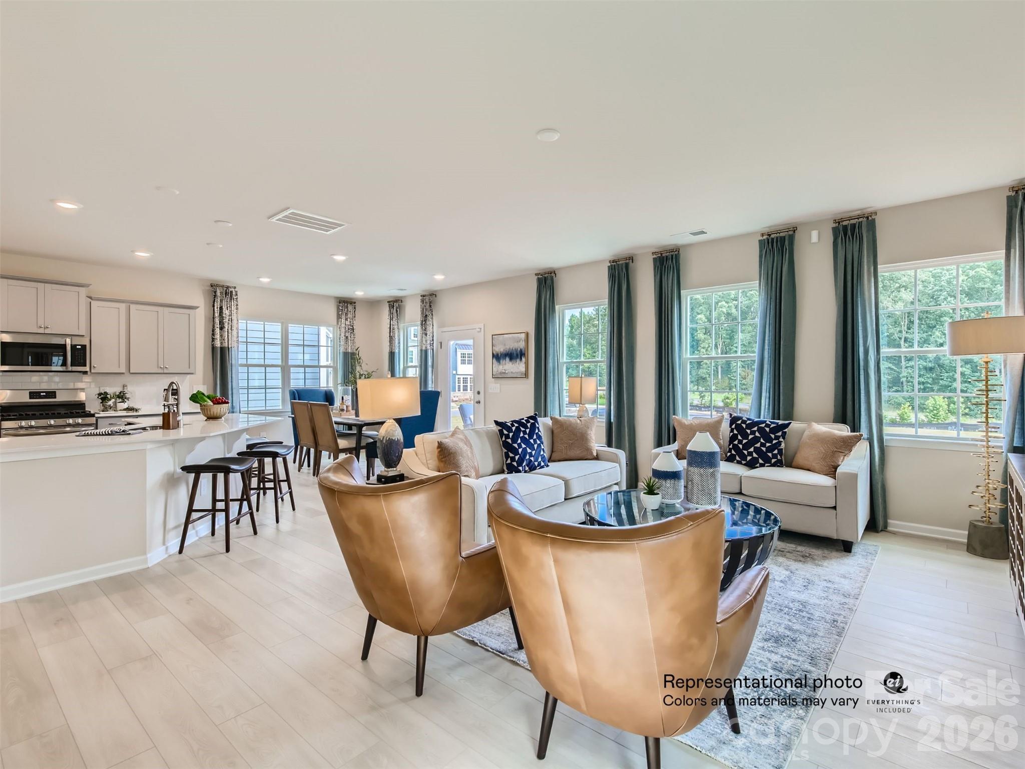 7020 Juneberry Way Maiden, NC 28650 - Photo 7 of 25 a living room with furniture and a large window
