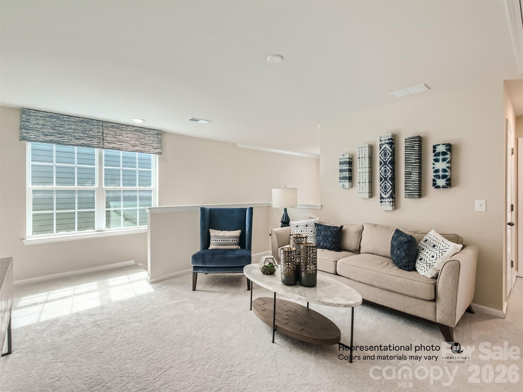 7020 Juneberry Way Maiden, NC 28650 - Photo 10 of 25 a living room with furniture and a flat screen tv