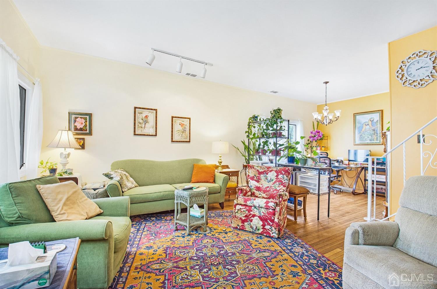 74 Brandywine Road Fords, NJ 08863 - Photo 2 of 16 a living room with furniture and a rug