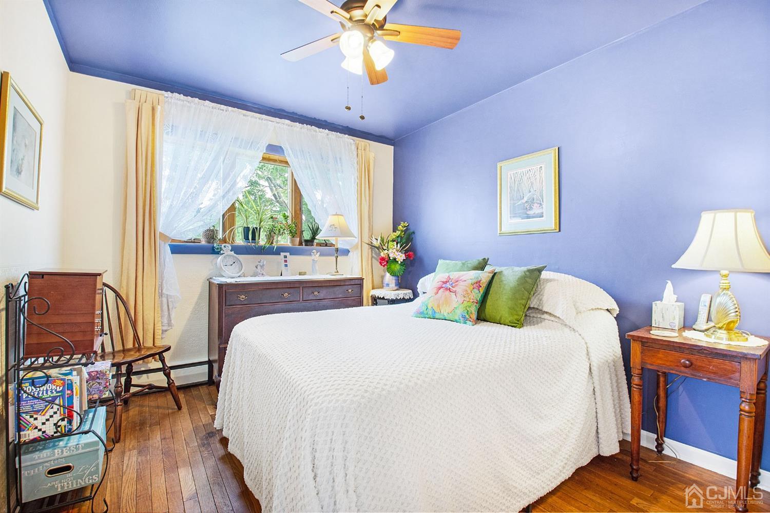 74 Brandywine Road Fords, NJ 08863 - Photo 11 of 16 a bed sitting in a bedroom next to a window