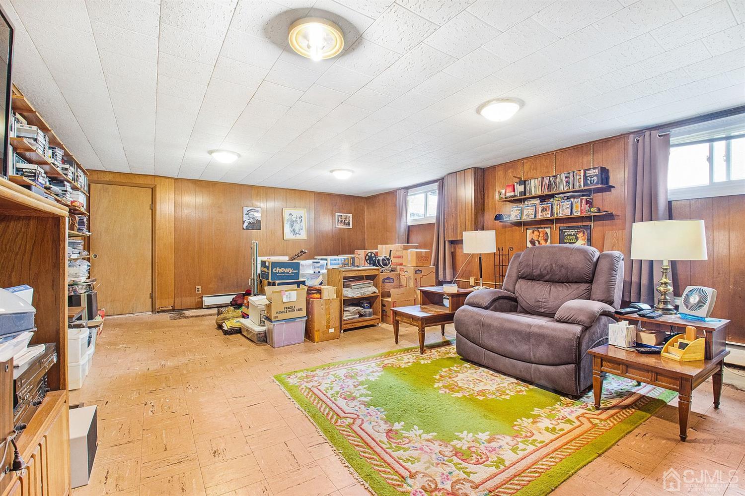 74 Brandywine Road Fords, NJ 08863 - Photo 13 of 16 a living room with furniture and a large window