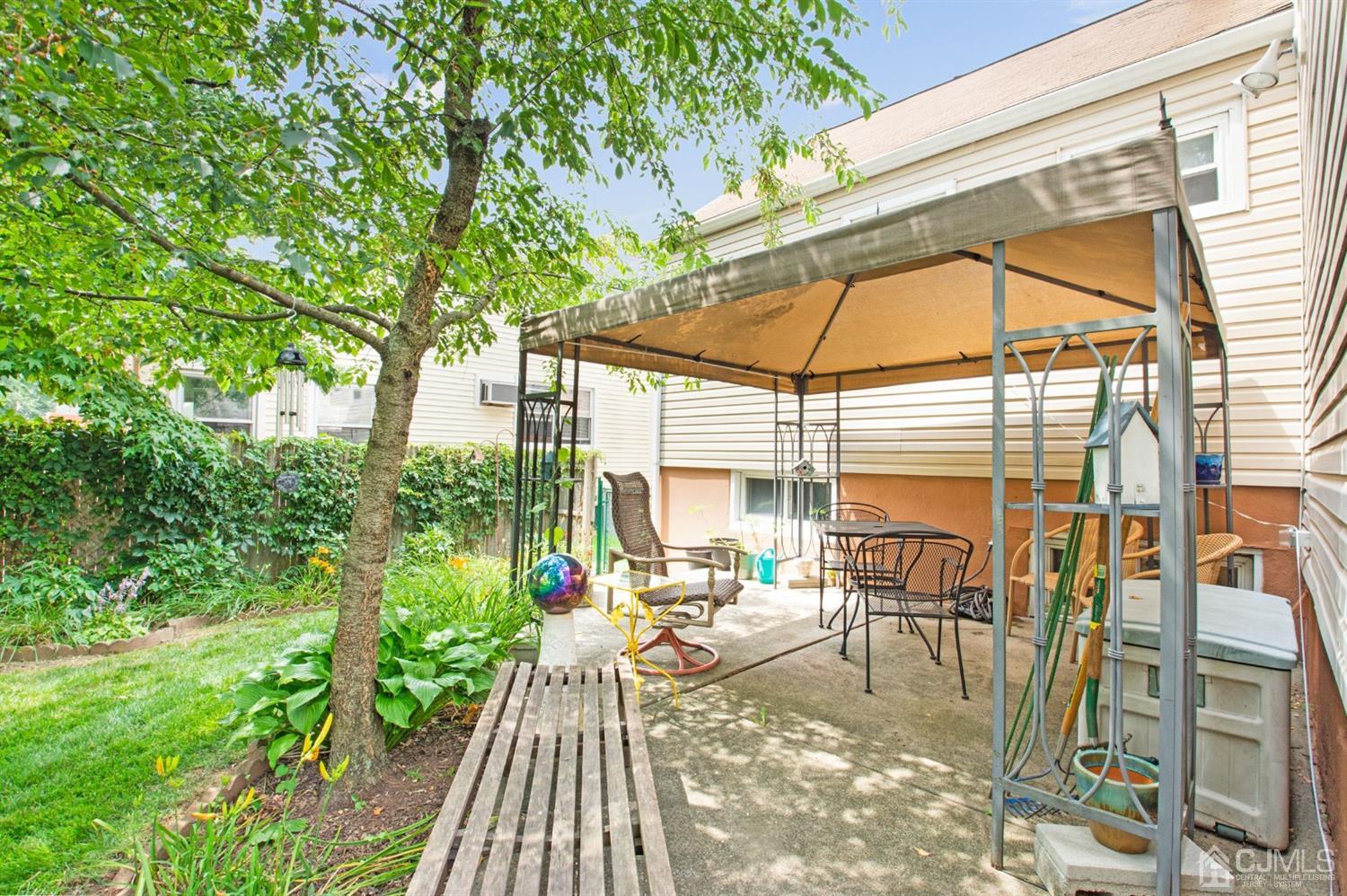 74 Brandywine Road Fords, NJ 08863 - Photo 15 of 16 a view of outdoor space yard deck and patio