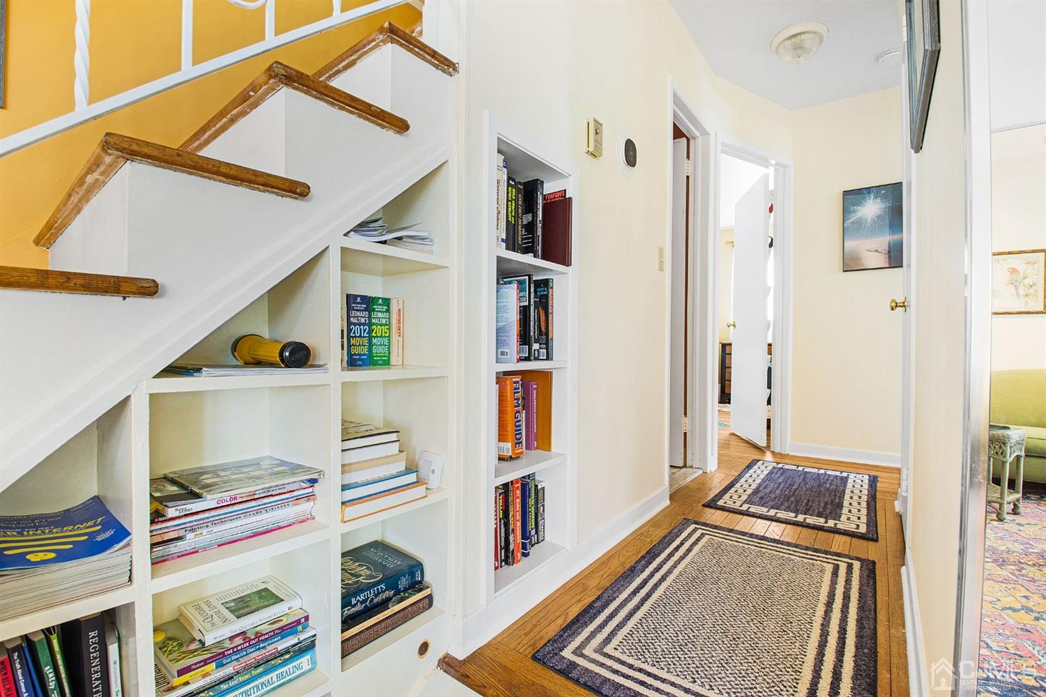 74 Brandywine Road Fords, NJ 08863 - Photo 7 of 16 a view of front door and bedroom with wooden floor