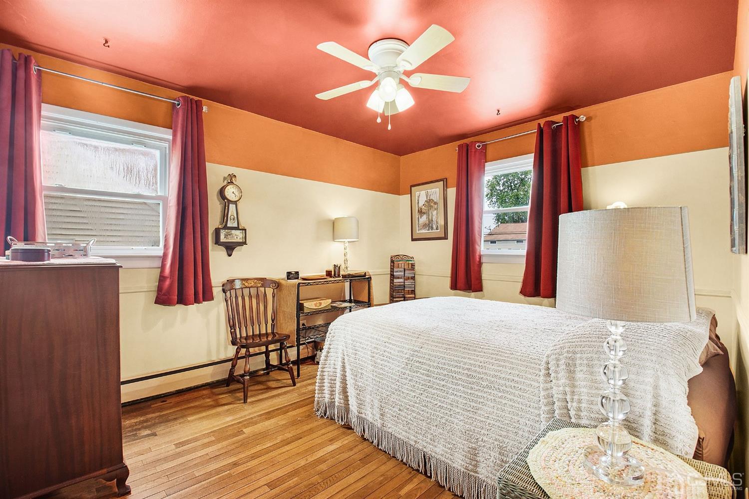 74 Brandywine Road Fords, NJ 08863 - Photo 10 of 16 a bedroom with a bed and a table with potted plants