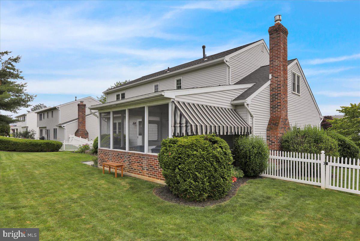 809 Allen Avenue Reading, PA 19605 - Photo 4 of 6 a front view of a house with a garden