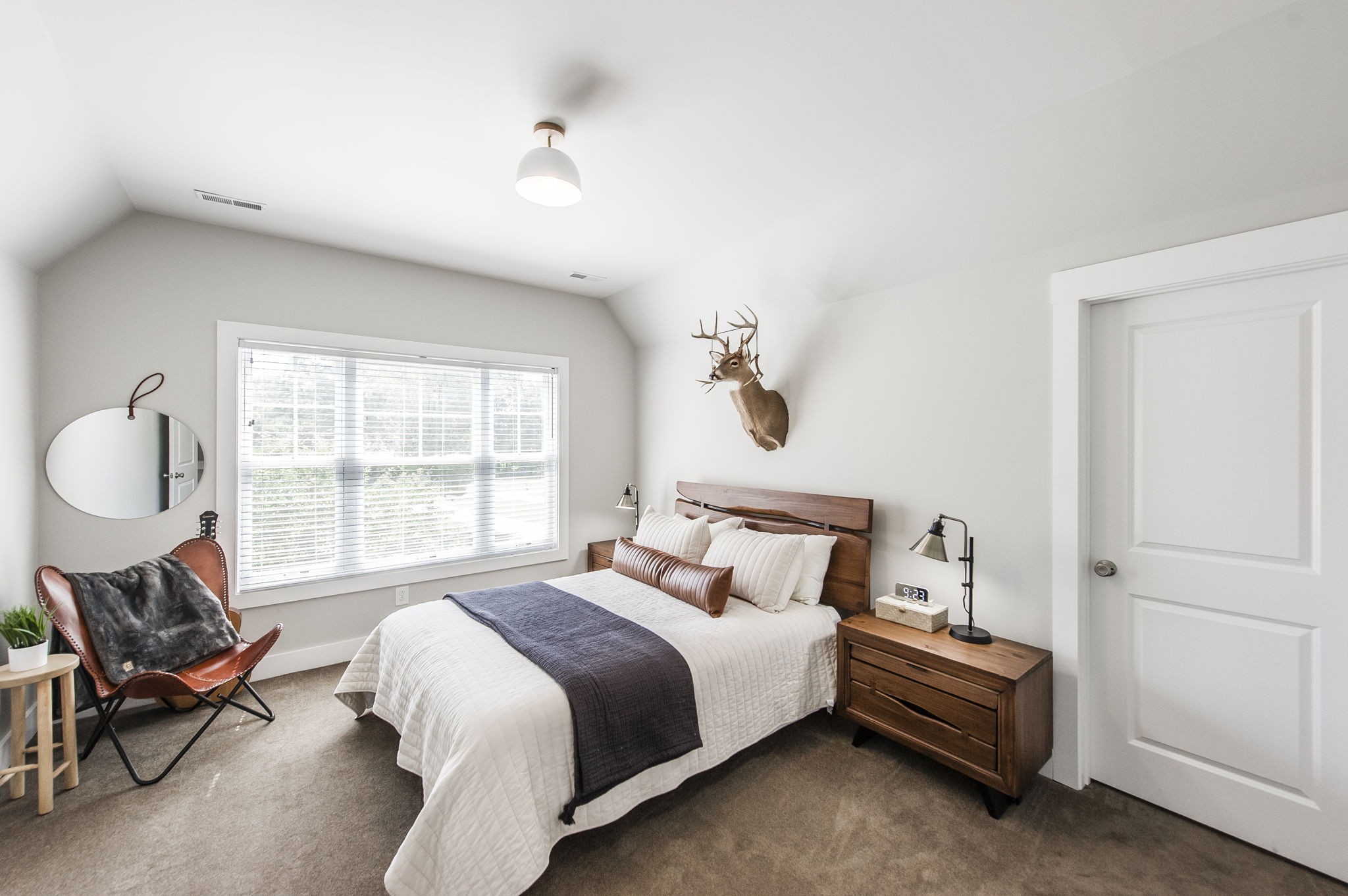 1956 Lake Road Greenbrier, TN 37073 - Photo 38 of 70 a bedroom with a bed chair and window