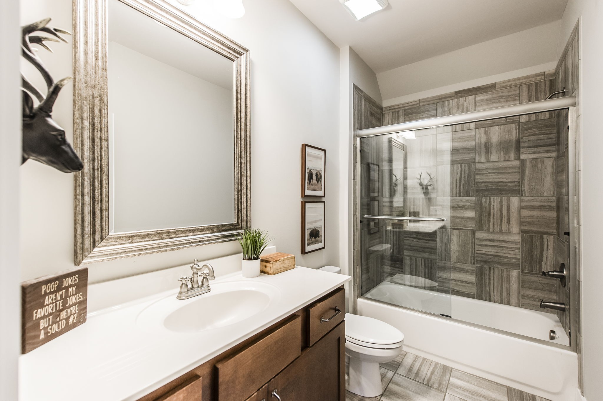1956 Lake Road Greenbrier, TN 37073 - Photo 39 of 70 a bathroom with a sink toilet and shower