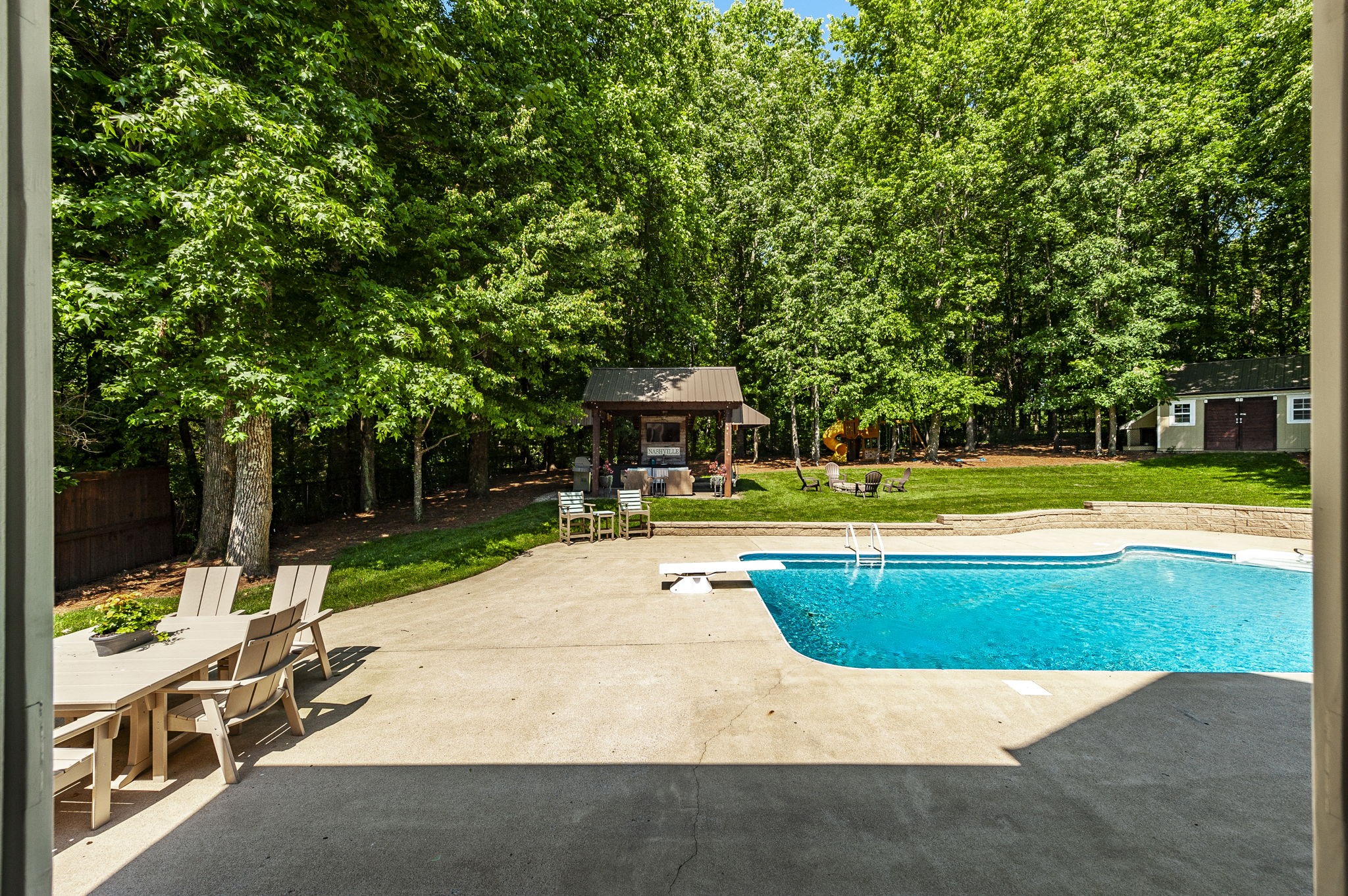 1956 Lake Road Greenbrier, TN 37073 - Photo 52 of 70 a view of a swimming pool with a patio