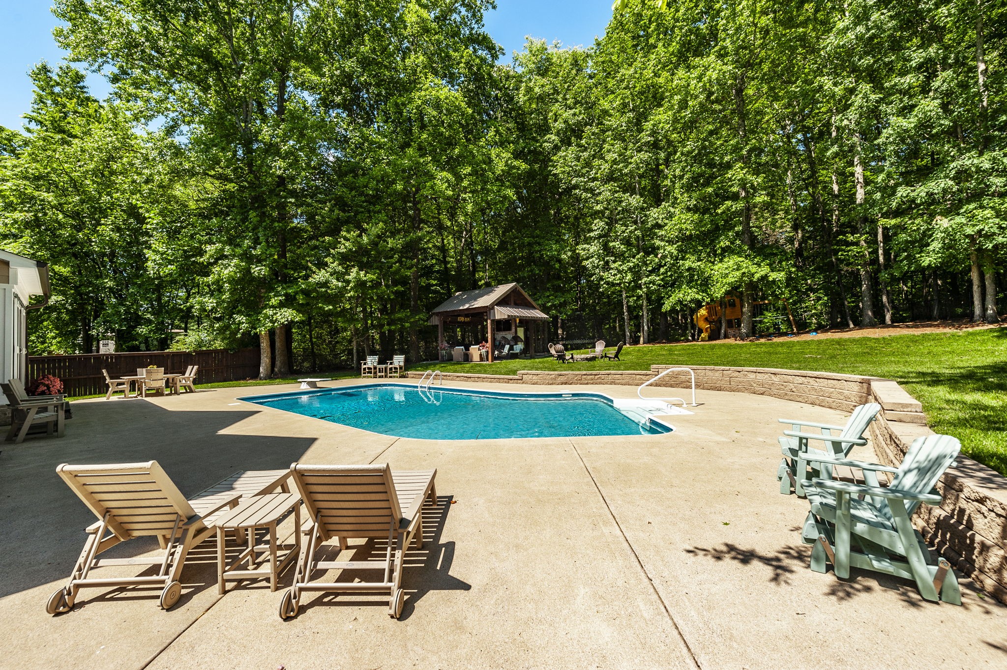1956 Lake Road Greenbrier, TN 37073 - Photo 56 of 70 a view of a swimming pool with lounge chairs