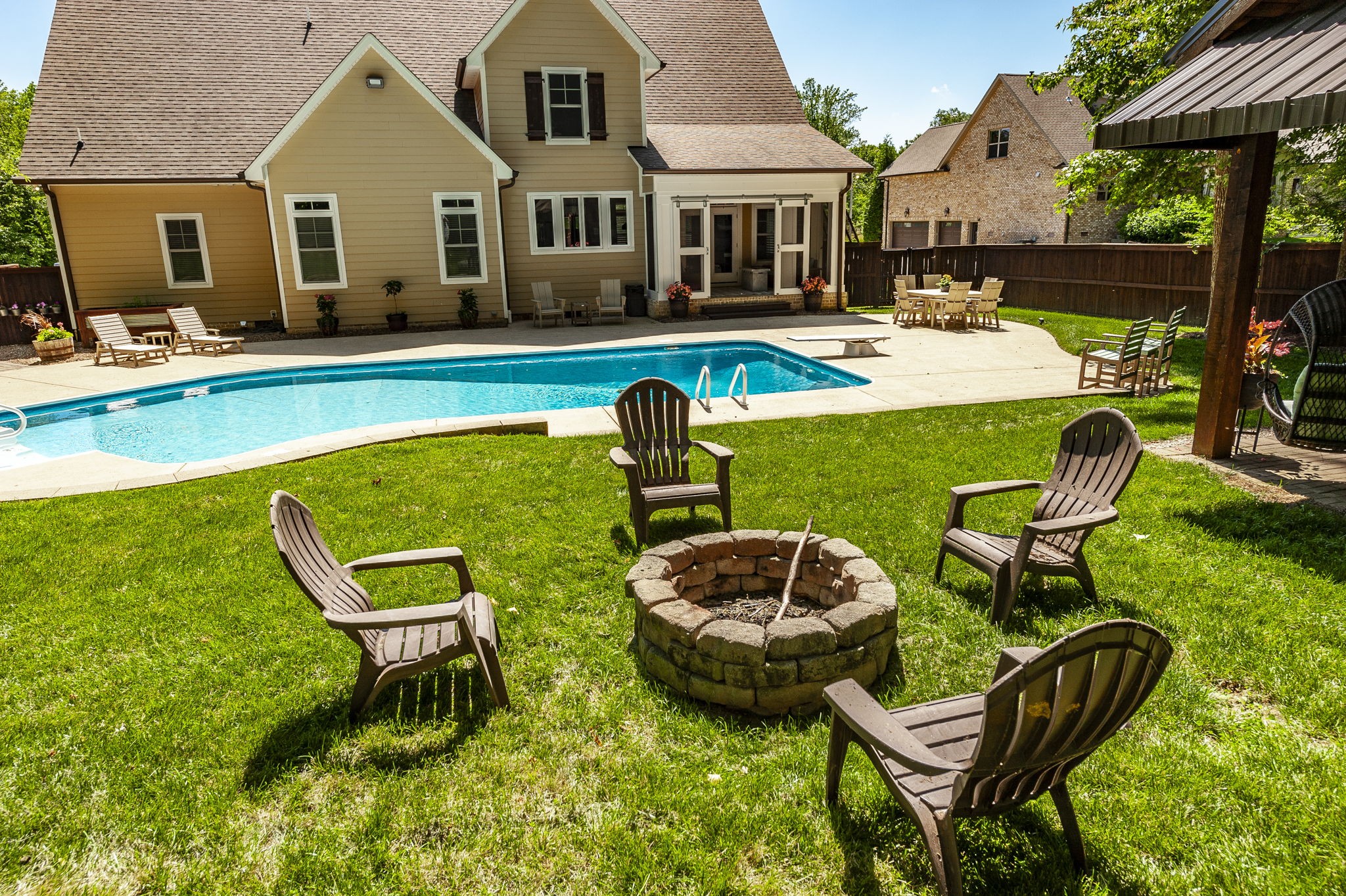 1956 Lake Road Greenbrier, TN 37073 - Photo 61 of 70 a swimming pool with outdoor seating and yard