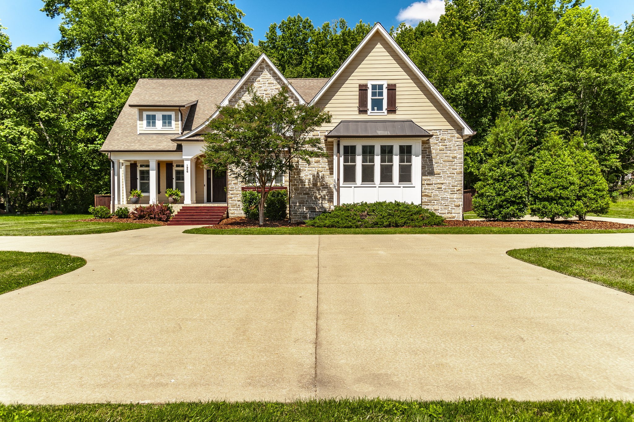 1956 Lake Road Greenbrier, TN 37073 - Photo 67 of 70 a front view of a house with a yard