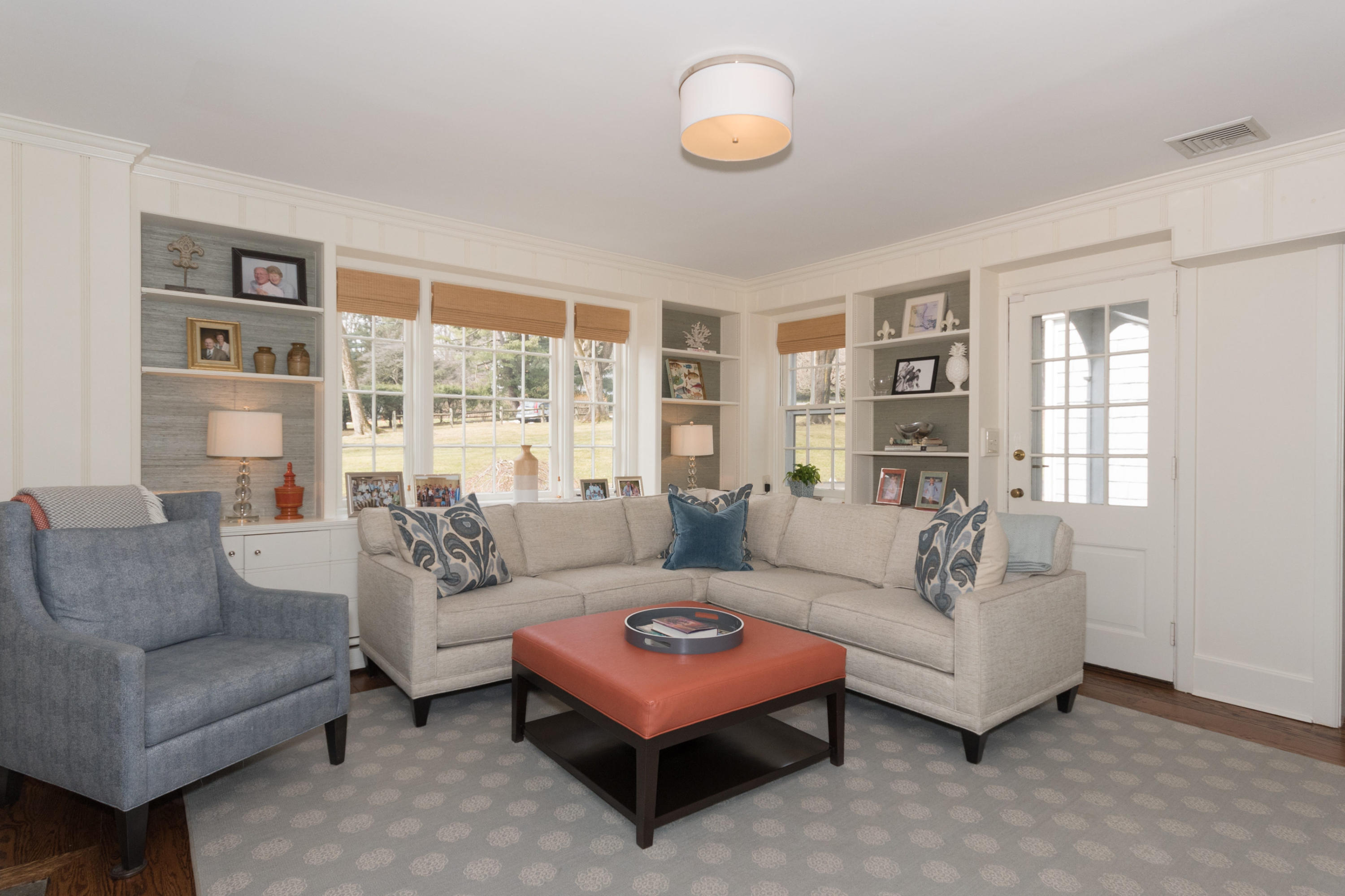 17 Point O Woods Road Darien, CT 06820 - Photo 17 of 44 a living room with furniture and a large window