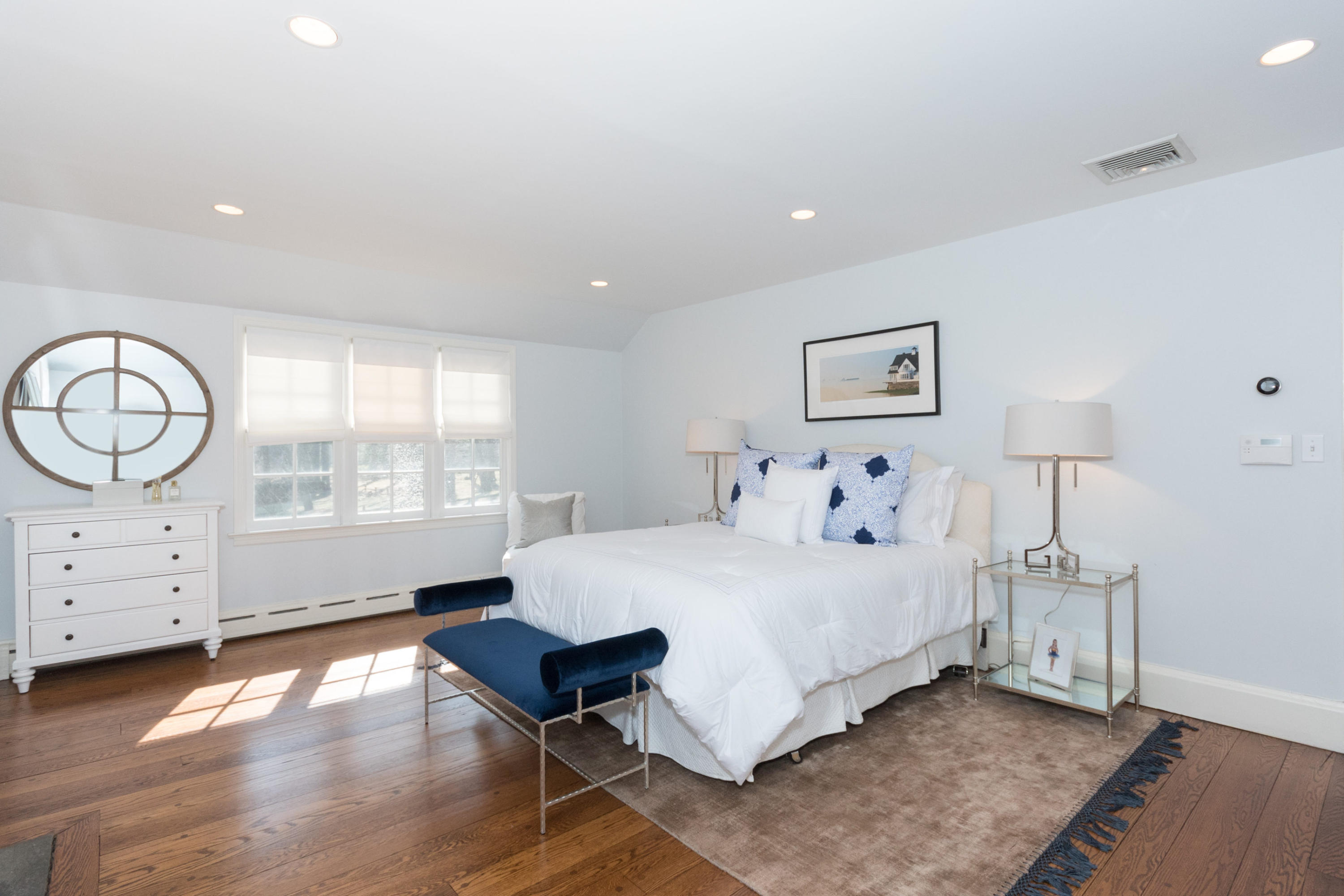 17 Point O Woods Road Darien, CT 06820 - Photo 19 of 44 a large white bed in a white room