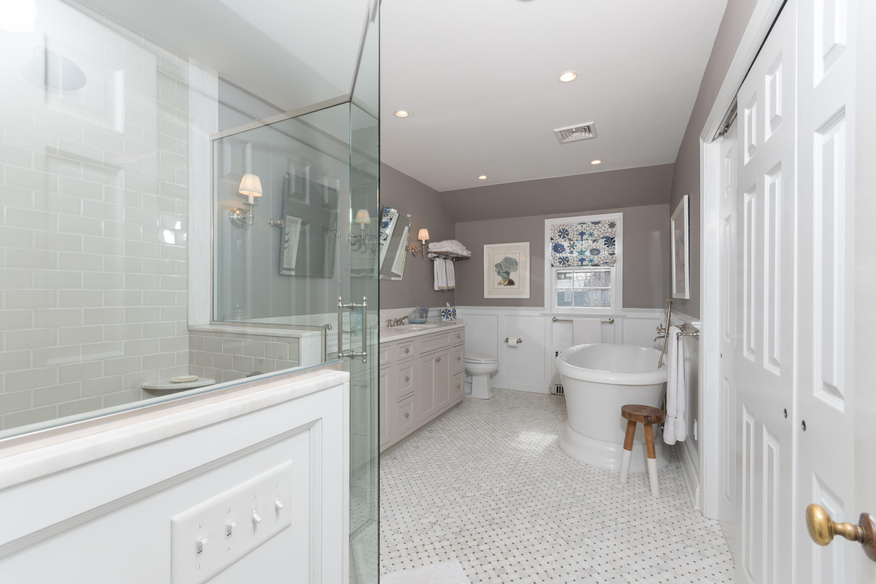 17 Point O Woods Road Darien, CT 06820 - Photo 22 of 44 a spacious bathroom with a bathtub shower sink and toilet