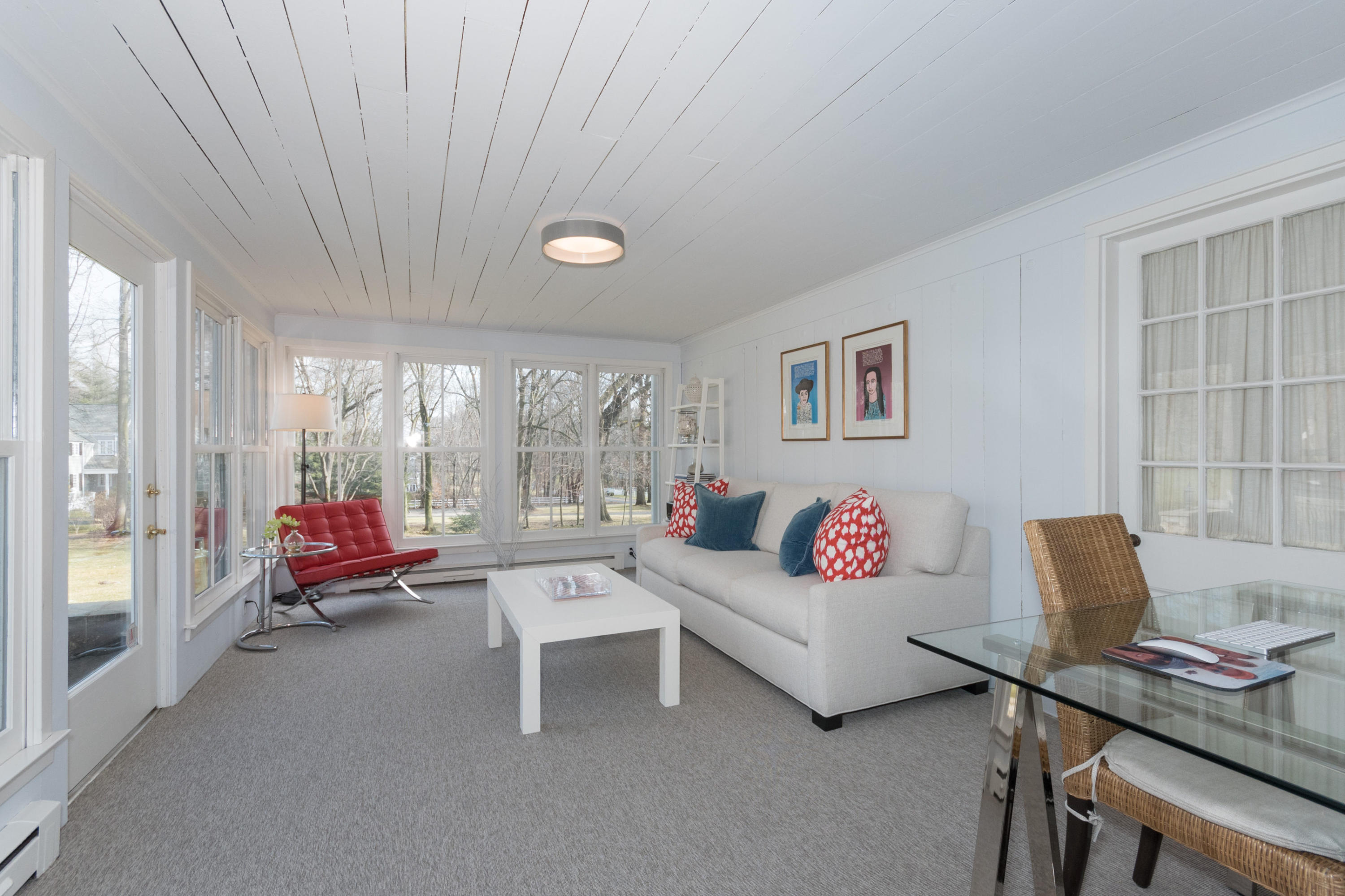 17 Point O Woods Road Darien, CT 06820 - Photo 23 of 44 a living room with furniture and a table