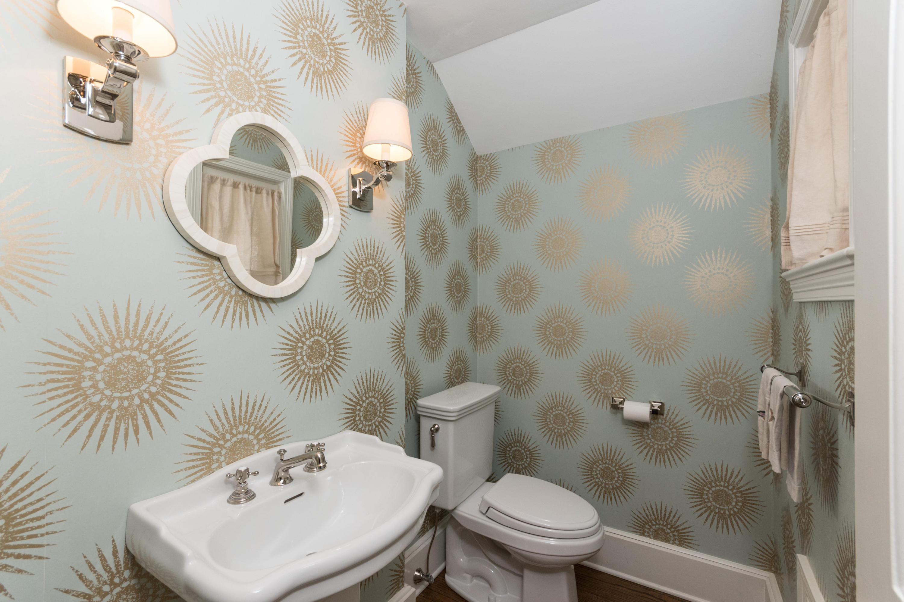 17 Point O Woods Road Darien, CT 06820 - Photo 26 of 44 a bathroom with a sink a toilet and a mirror