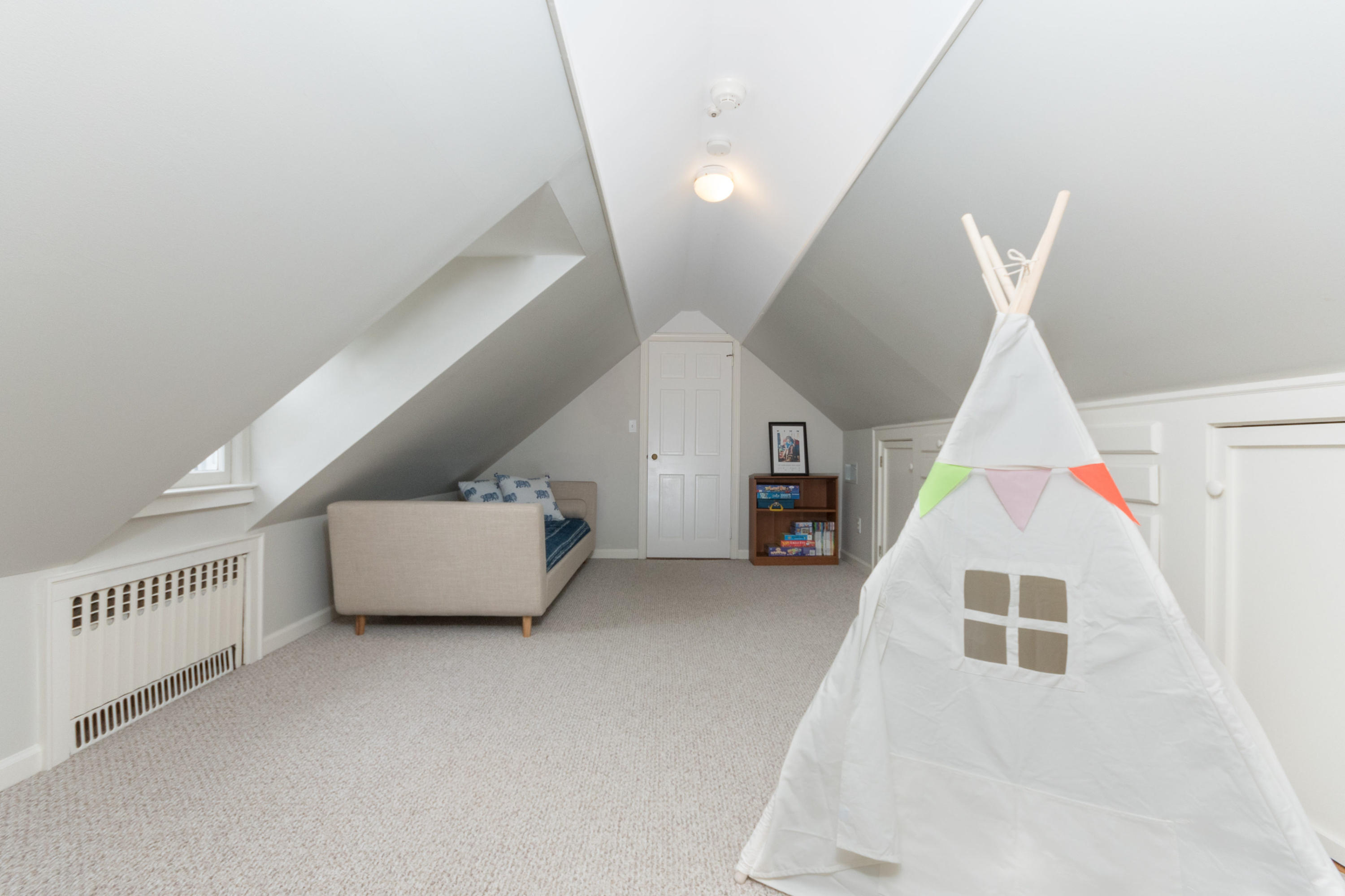 17 Point O Woods Road Darien, CT 06820 - Photo 30 of 44 a view of a livingroom with furniture and stairs
