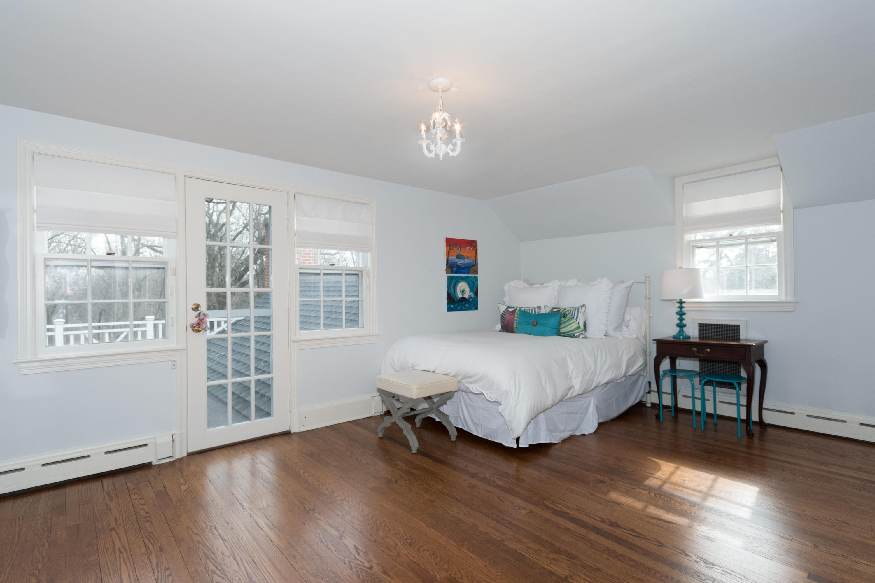 17 Point O Woods Road Darien, CT 06820 - Photo 34 of 44 a bedroom with a bed furniture and a window