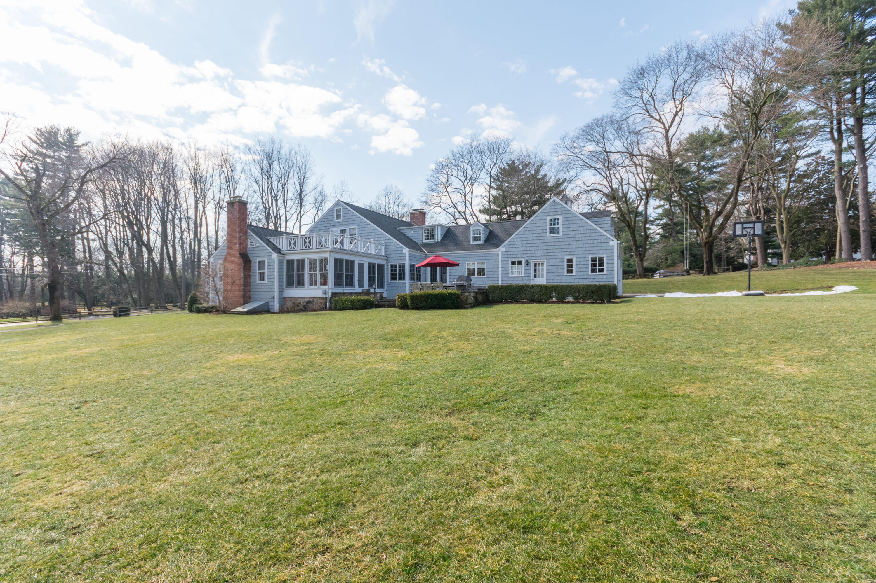17 Point O Woods Road Darien, CT 06820 - Photo 40 of 44 a view of a large garden with plants and large trees