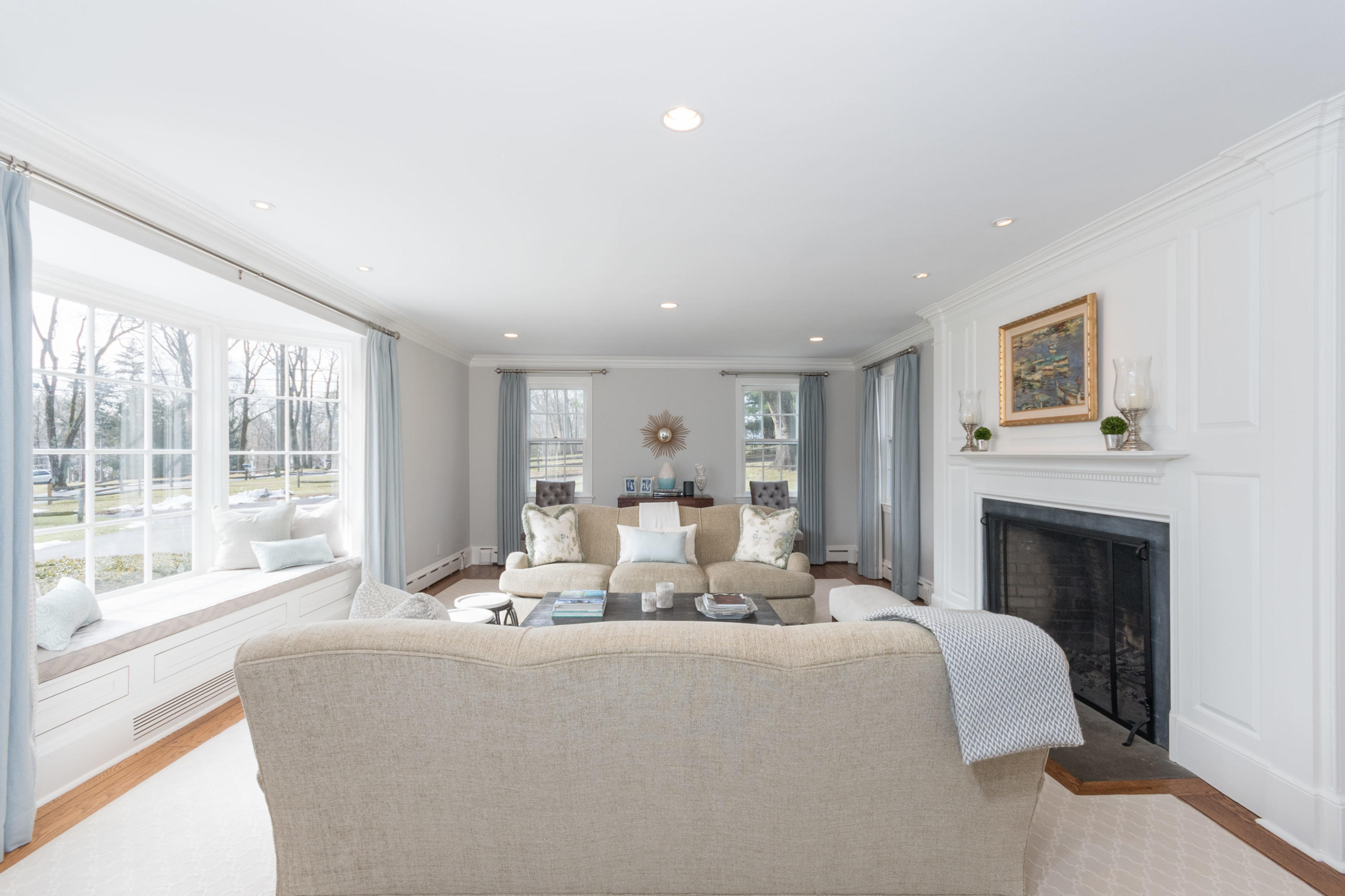 17 Point O Woods Road Darien, CT 06820 - Photo 10 of 44 a living room with furniture and a fireplace