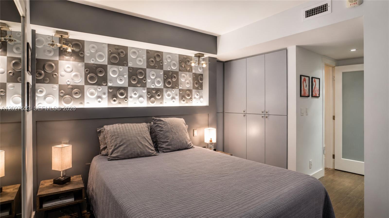 100 Lincoln Road, Unit 533 Miami Beach, FL 33139 - Photo 11 of 26 a bedroom with a bed and a window