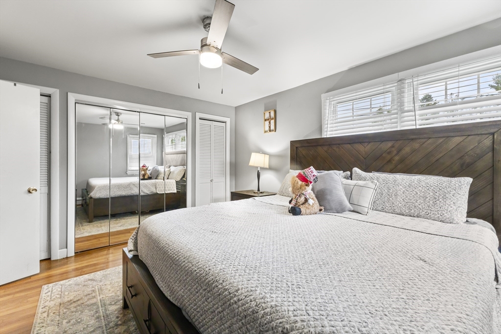 337 Lepes Road Somerset, MA 02726 - Photo 13 of 29 a bedroom with a bed and a large mirror